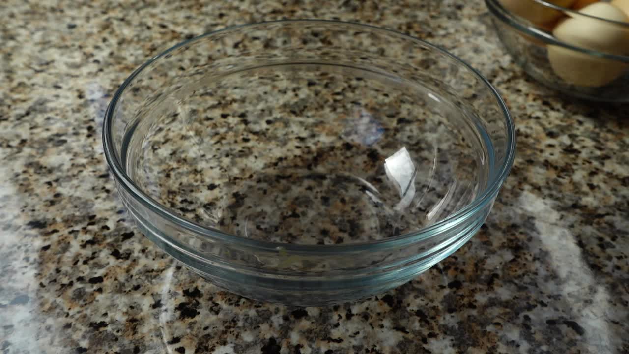 Stock Video Cracking A Raw Egg Into A Glass Bowl Live Wallpaper For PC