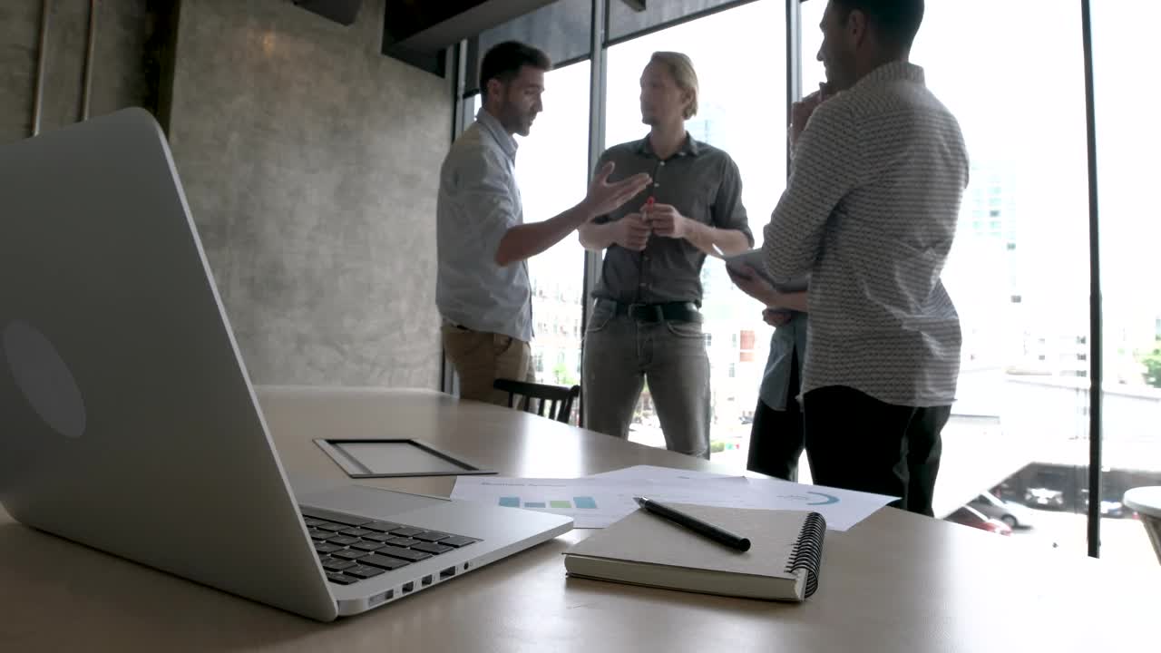 Stock Video Coworkers Standing By A Window Live Wallpaper For PC