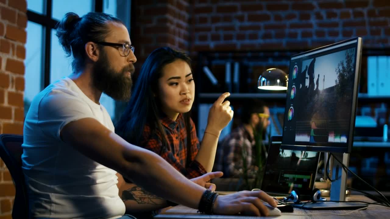Stock Video Coworkers Editing Video On The Computer Live Wallpaper For PC