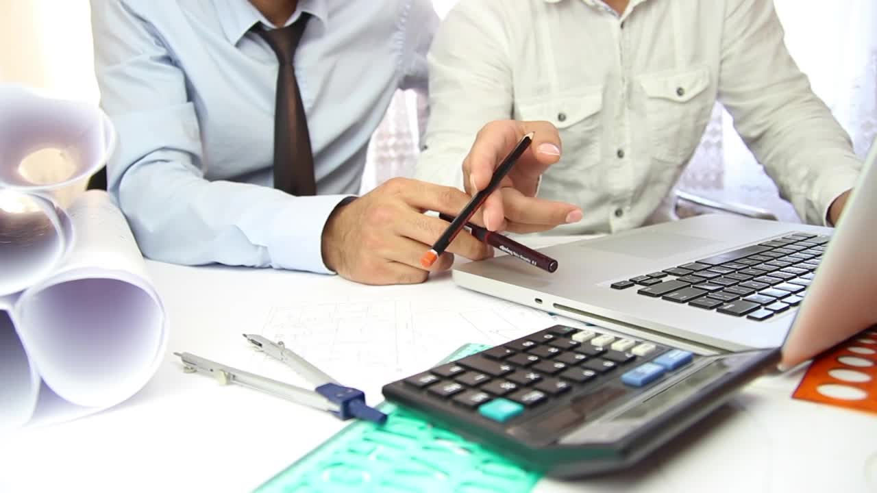 Stock Video Coworkers Discussing A Project With A Laptop Live Wallpaper For PC