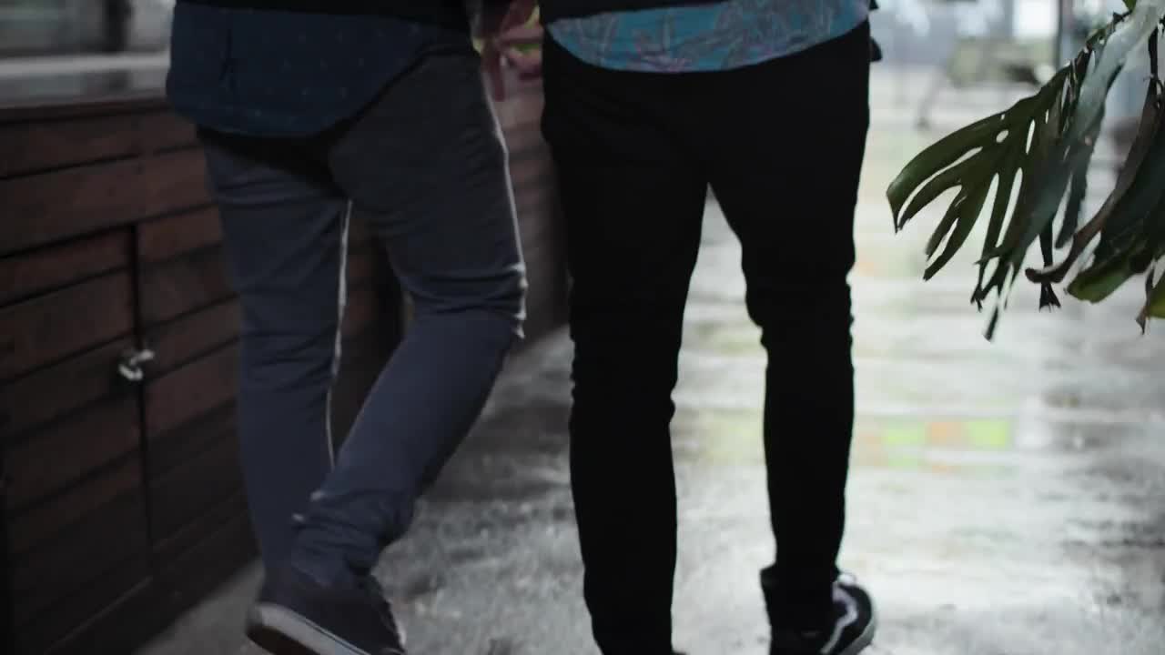 Stock Video Couple Walking In The Street Using An Umbrella Live Wallpaper For PC