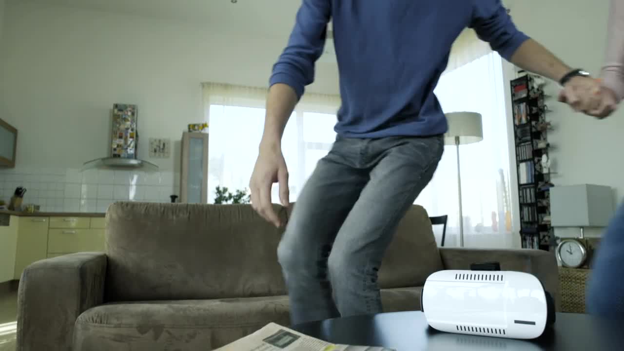 Stock Video Couple Trying Vr Glasses On The Living Room Live Wallpaper For PC