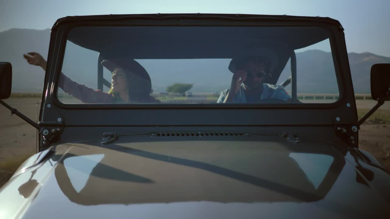 Stock Video Couple Traveling Down A Road In A Jeep Live Wallpaper For PC