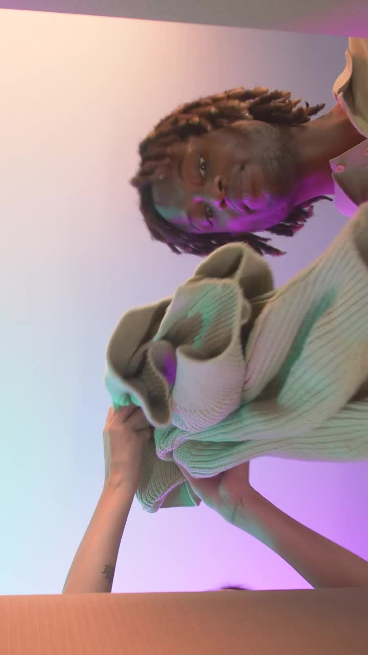 Stock Video Couple Taking Clothes Out Of A Box Live Wallpaper For PC