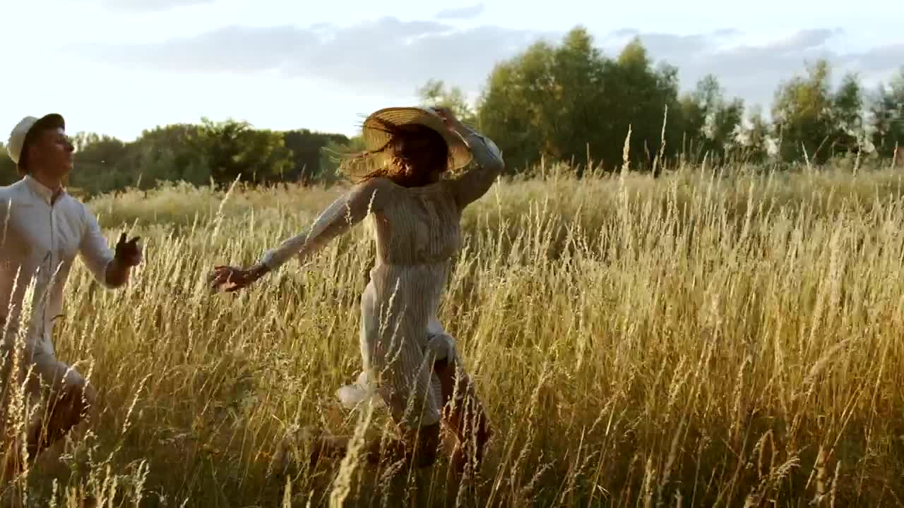 Stock Video Couple Take Romantic Run Through Country Field Live Wallpaper For PC
