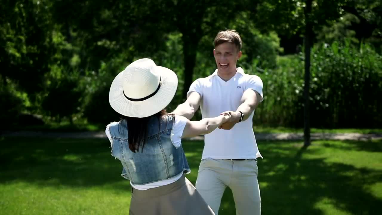 Stock Video Couple Spin Each Other Around In Sunny Park Live Wallpaper For PC