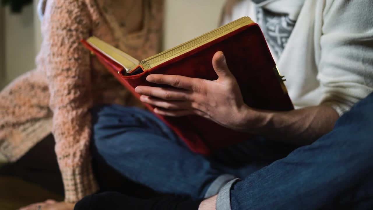 Stock Video Couple Sitting Watching A Photo Album Live Wallpaper For PC