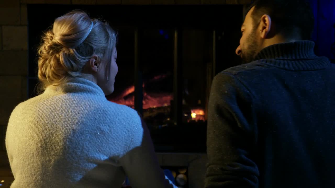 Stock Video Couple Sitting In Front Of The Fireplace Live Wallpaper For PC