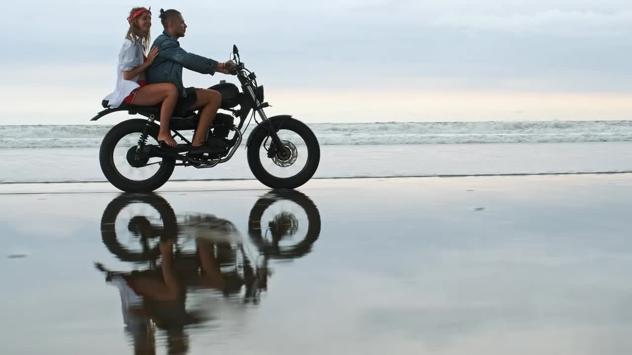 Stock Video Couple Riding A Motorcycle In The Beach Live Wallpaper For PC