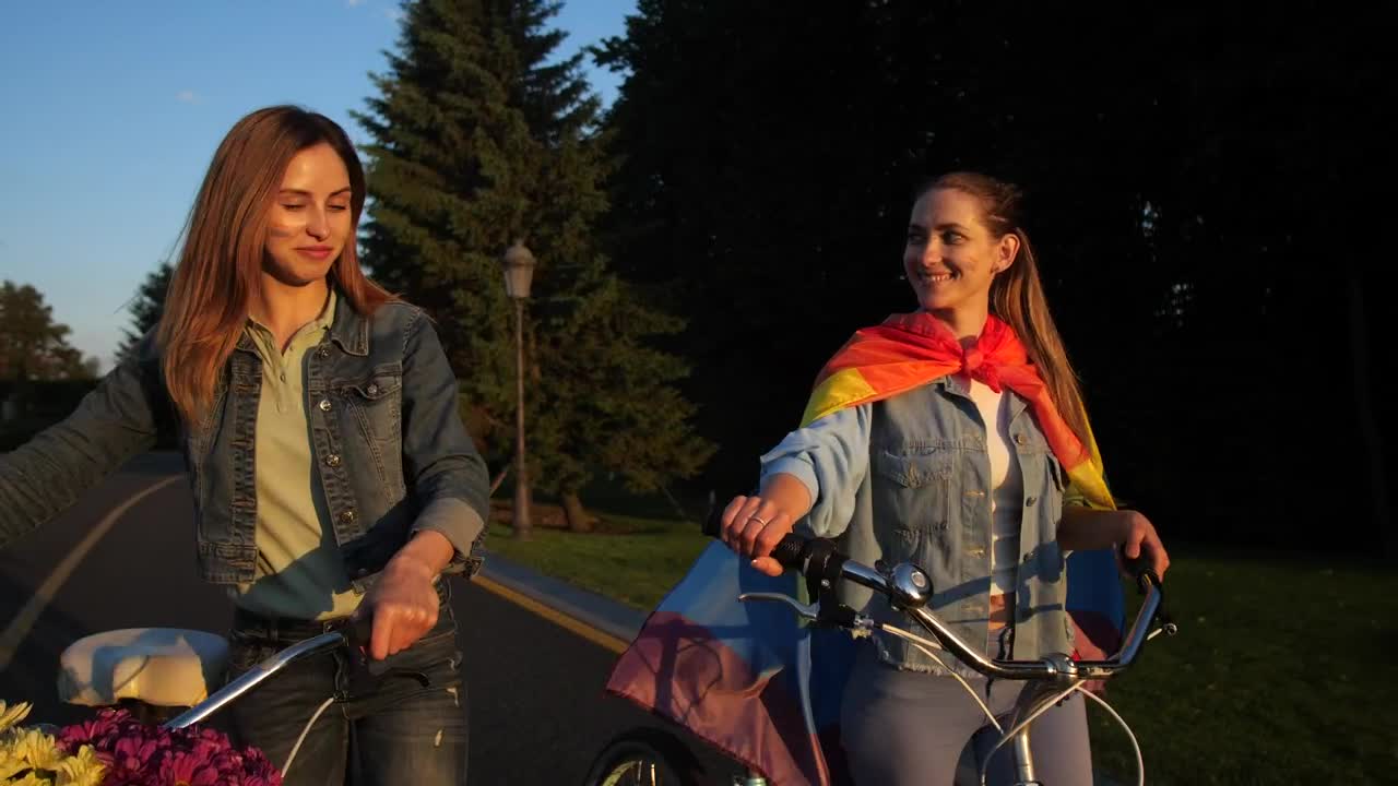 Stock Video Couple Pushing Bikes With Flowers Live Wallpaper For PC