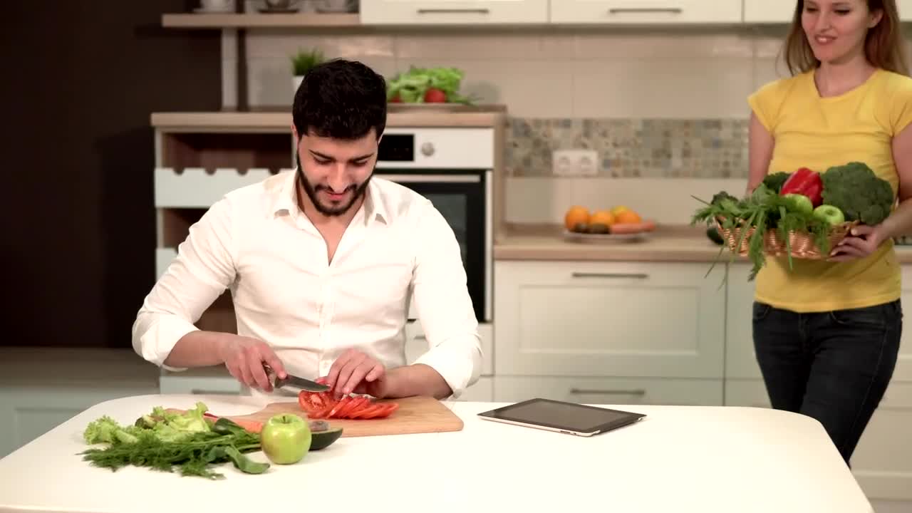 Stock Video Couple Preparing Dinner With Fresh Groceries Live Wallpaper For PC