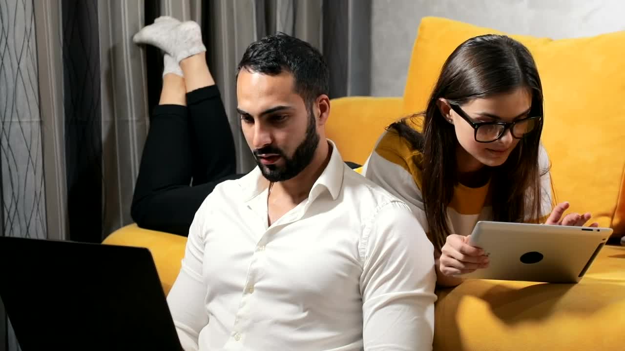 Stock Video Couple On Laptop And Tablet Work During Lockdown Live Wallpaper For PC