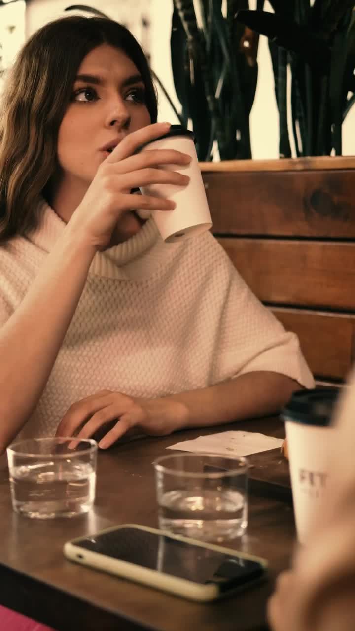 Stock Video Couple Of Girls Chatting In A Coffee Shop Live Wallpaper For PC