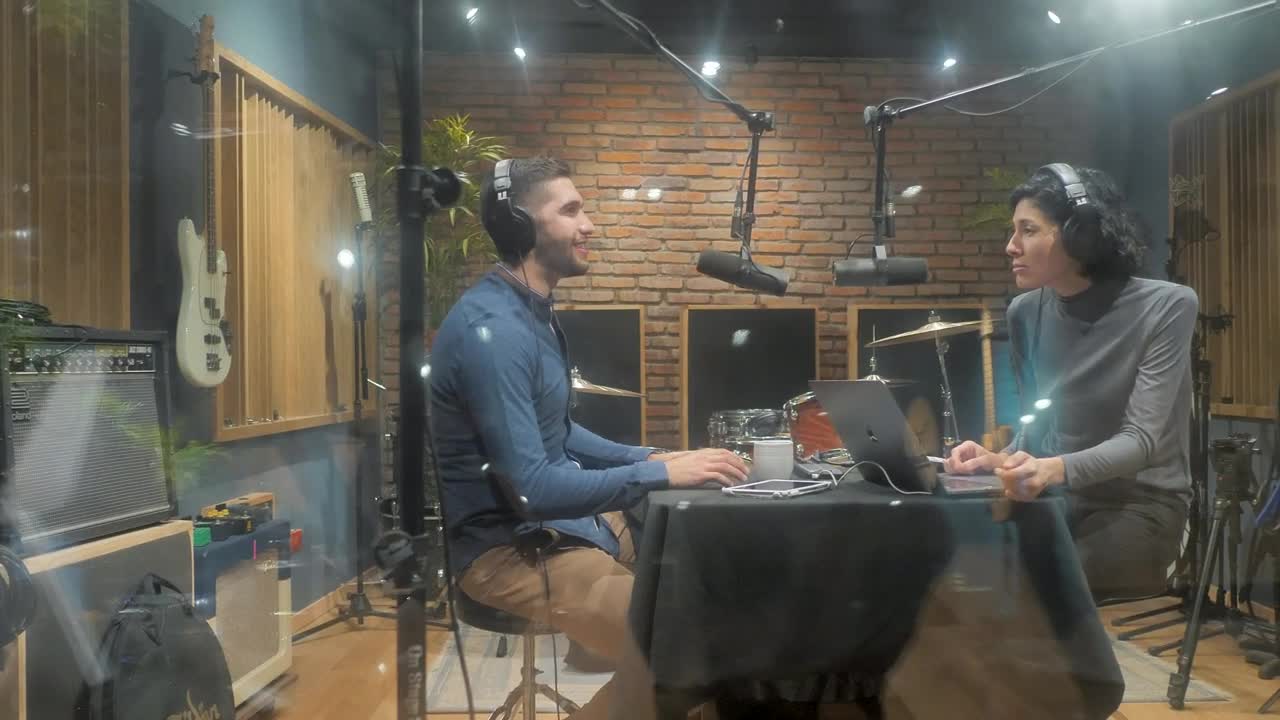 Stock Video Couple Of Broadcasters Recording Live Wallpaper For PC