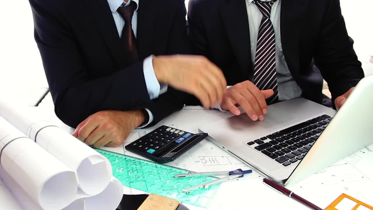 Stock Video Couple Of Architects Working On A Computer Live Wallpaper For PC