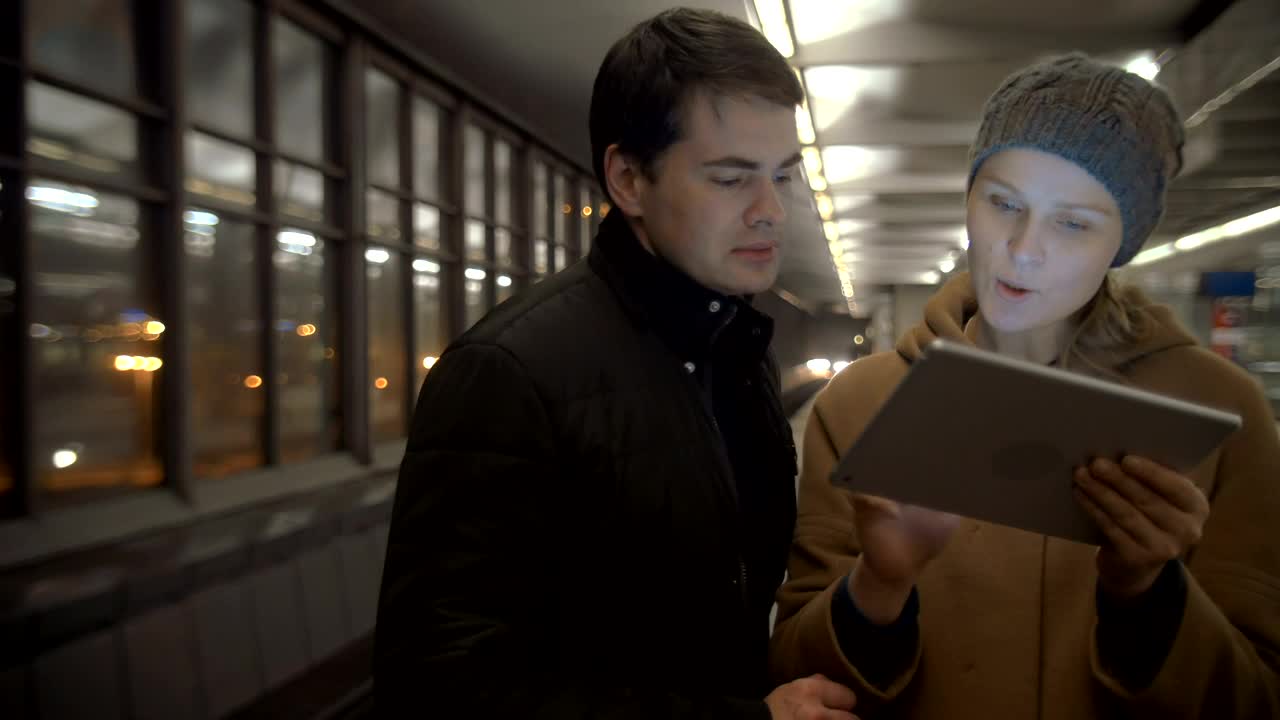 Stock Video Couple Looking For Directions On A Tablet Live Wallpaper For PC