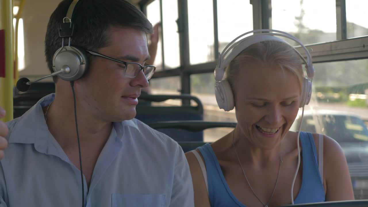 Stock Video Couple Listening To Music On A Bus Live Wallpaper For PC