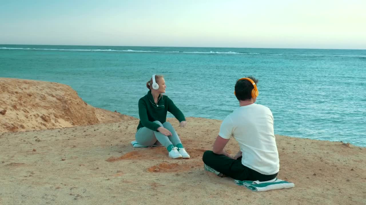 Stock Video Couple Listening To Music On A Cliff Live Wallpaper For PC