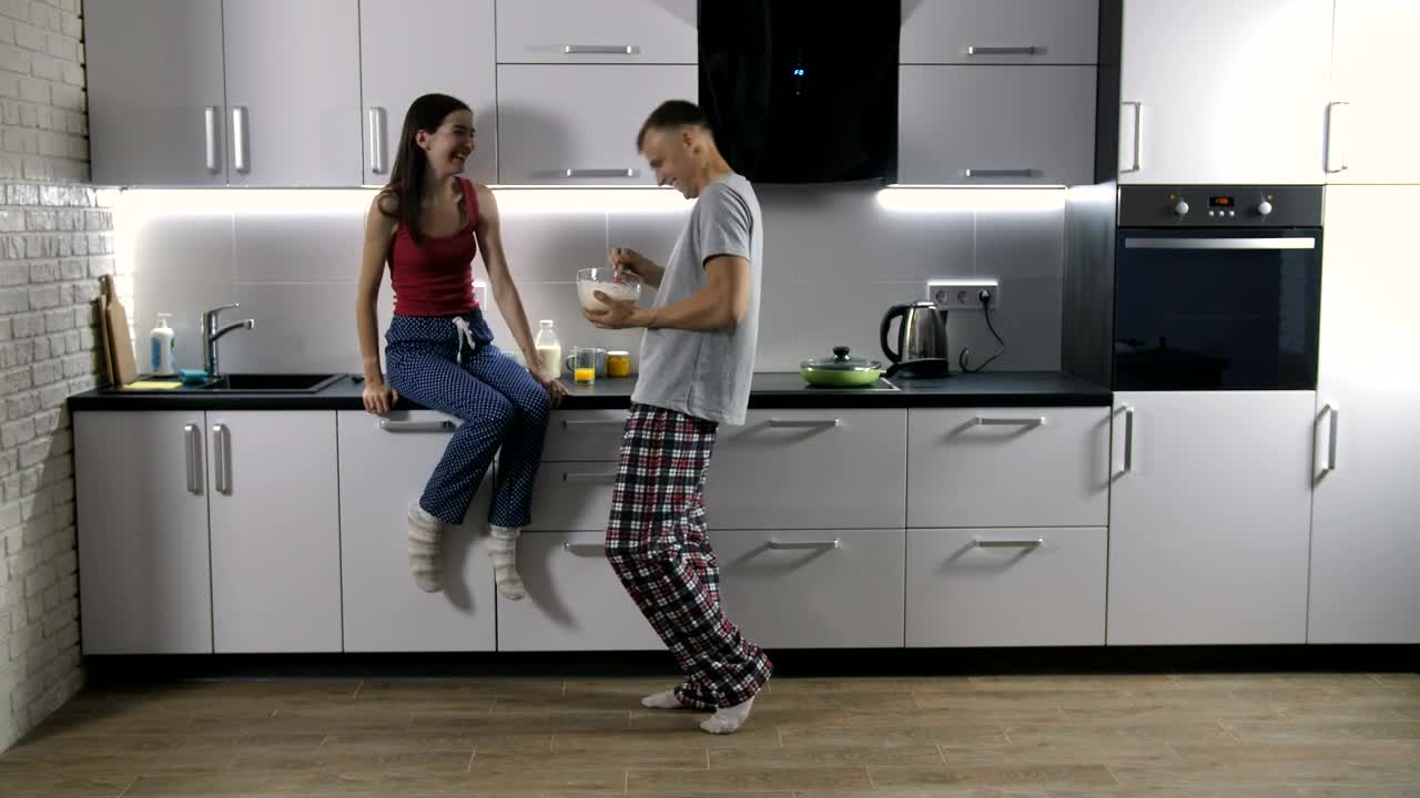 Stock Video Couple Listening To Music In The Kitchen Live Wallpaper For PC