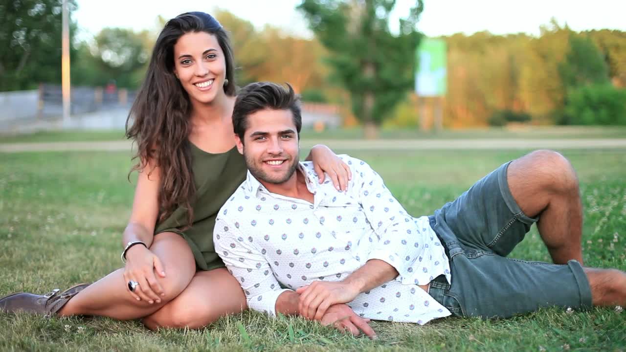 Stock Video Couple Laying Together In The Park Live Wallpaper For PC
