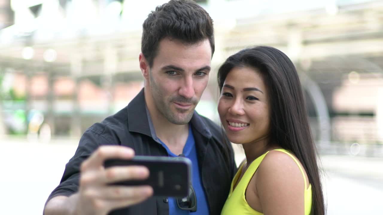 Stock Video Couple In Love Taking Selfies On The Street Live Wallpaper For PC