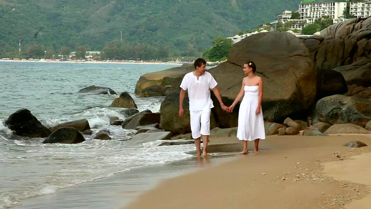 Stock Video Couple Holding Hands Walking In The Beach Live Wallpaper For PC
