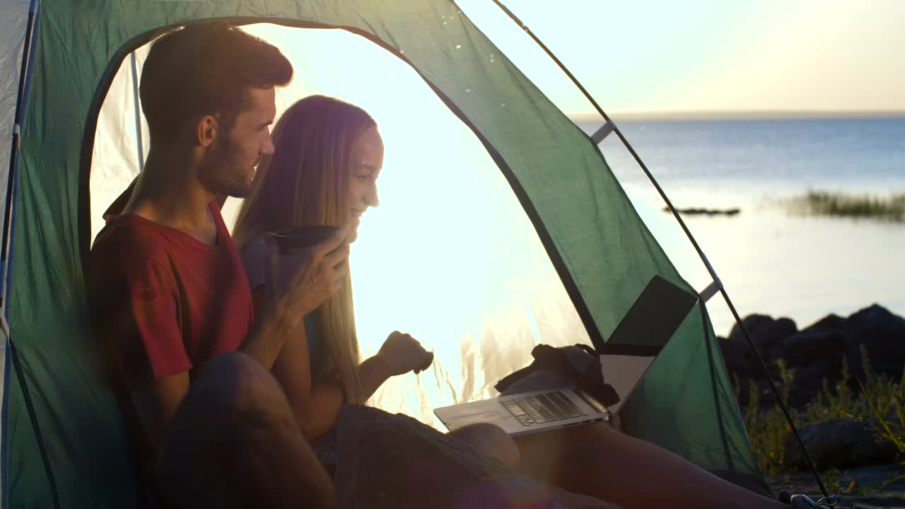 Stock Video Couple Having A Video Call While Camping Live Wallpaper For PC