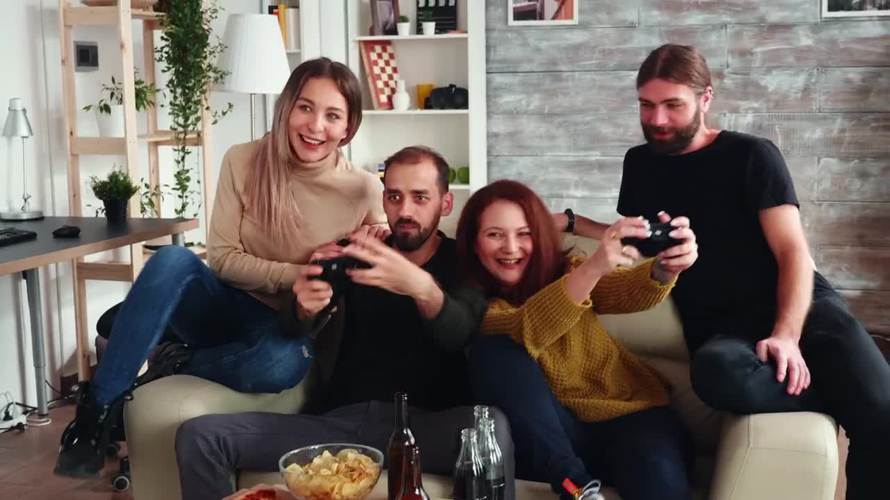 Stock Video Couple Enjoy Friendly Gaming Competition At Home Live Wallpaper For PC