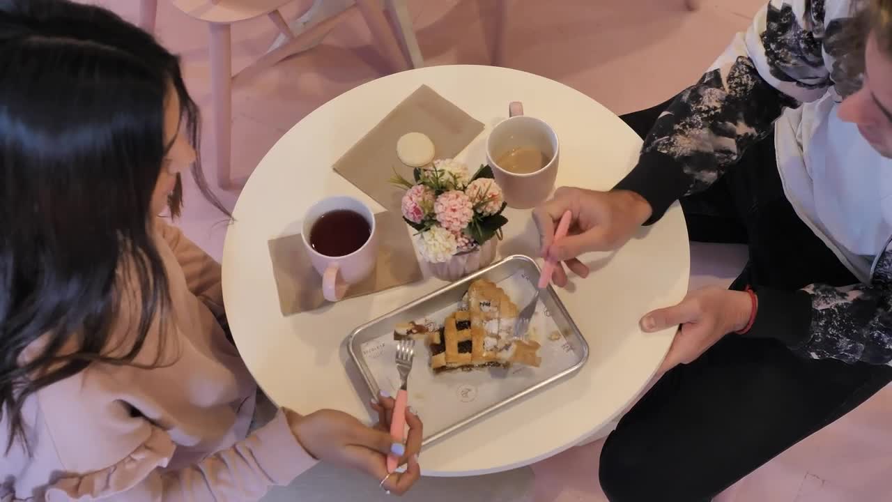 Stock Video Couple Eating A Slice Of Cake With Coffee On A Live Wallpaper For PC