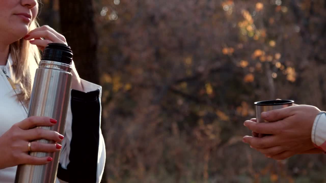 Stock Video Couple Drinking Hot Tea Outdoors Live Wallpaper For PC