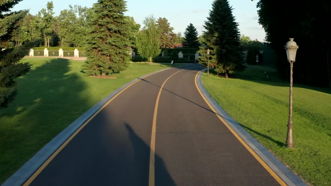Stock Video Couple Casting Long Shadows As They Ride Bikes Live Wallpaper For PC