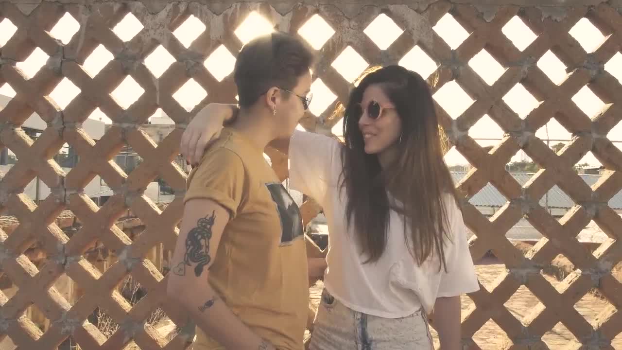 Stock Video Couple Caressing In Front Of Fence Live Wallpaper For PC