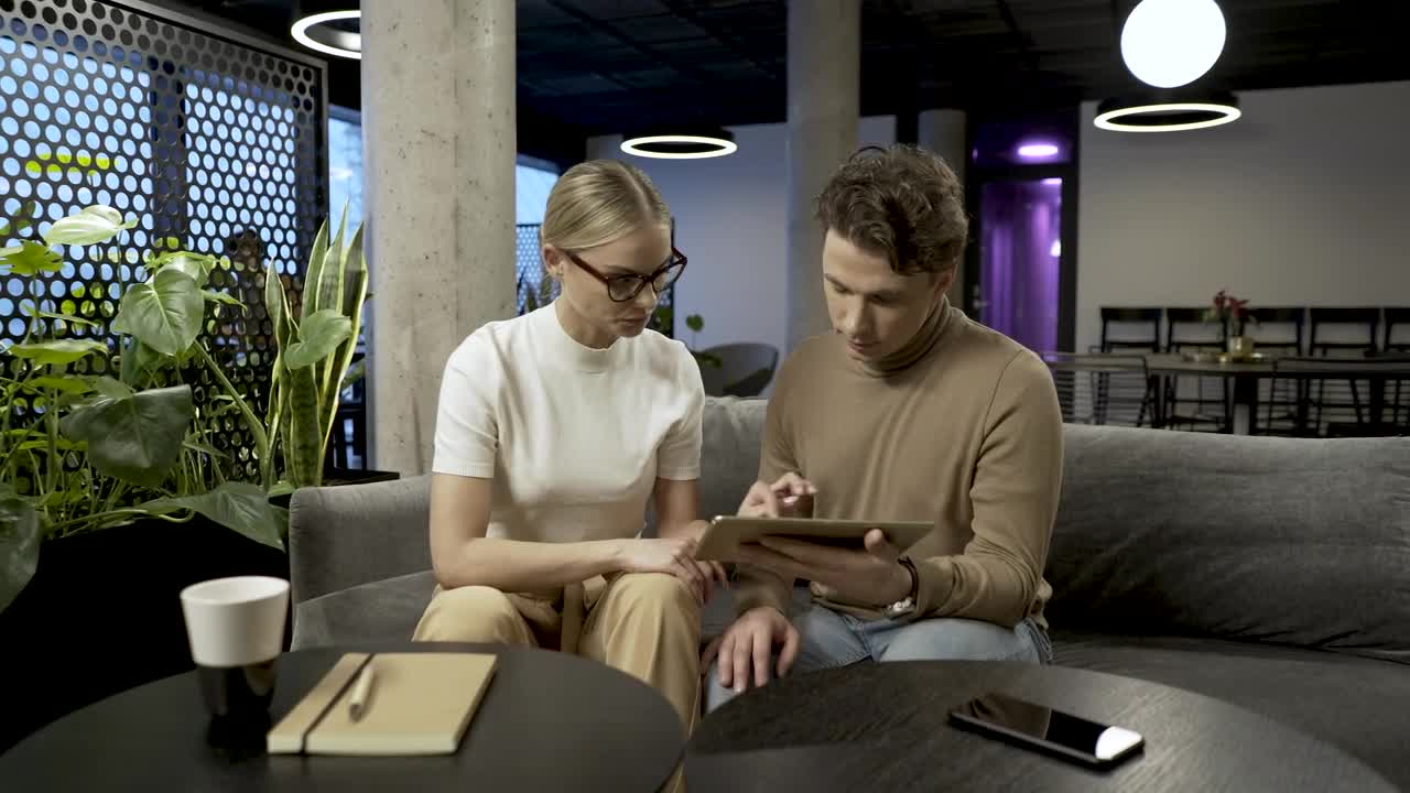 Stock Video Couple Brainstorming With A Tablet Live Wallpaper For PC
