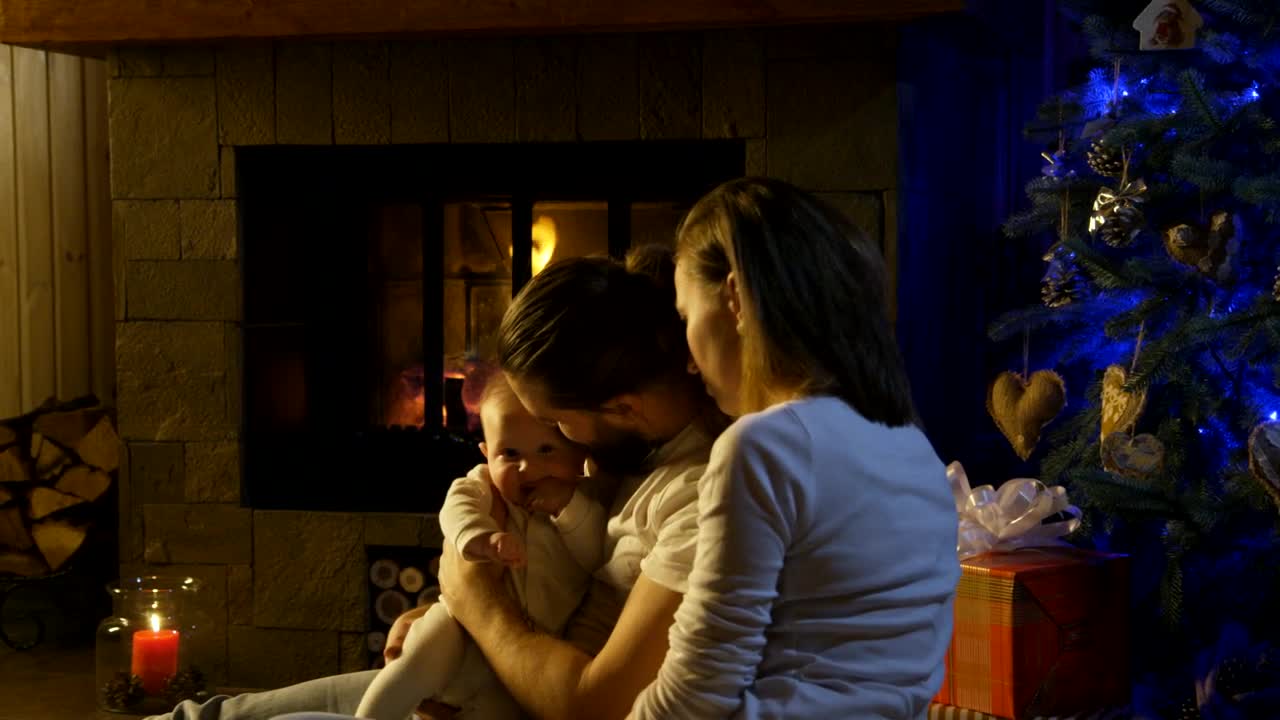 Stock Video Couple And Baby Near The Fireplace Live Wallpaper For PC