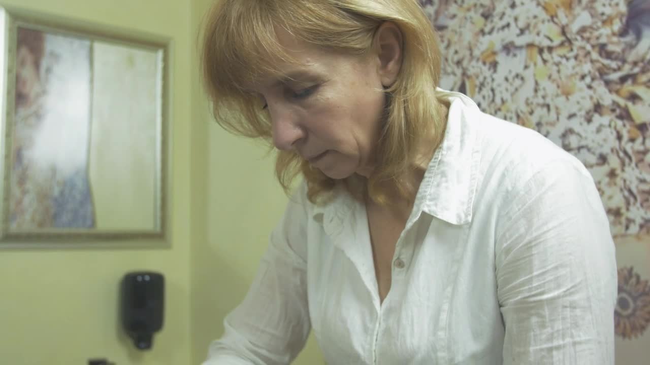 Stock Video Cosmetologist Massaging Around The Eyes Live Wallpaper For PC