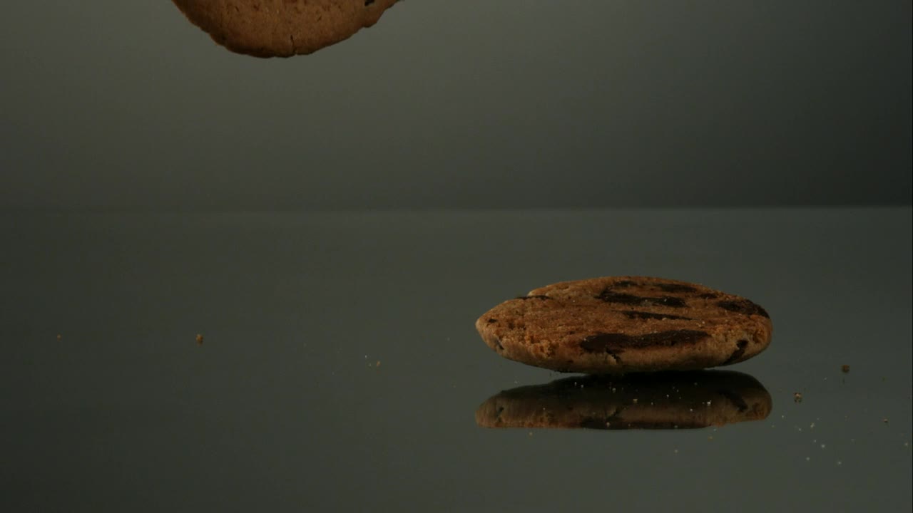 Stock Video Cookies Falling In Slow Motion To Mirror Surface Live Wallpaper For PC