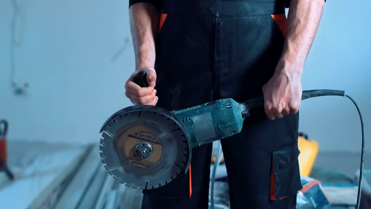 Stock Video Construction Worker Shows A Cutting Tool Live Wallpaper For PC