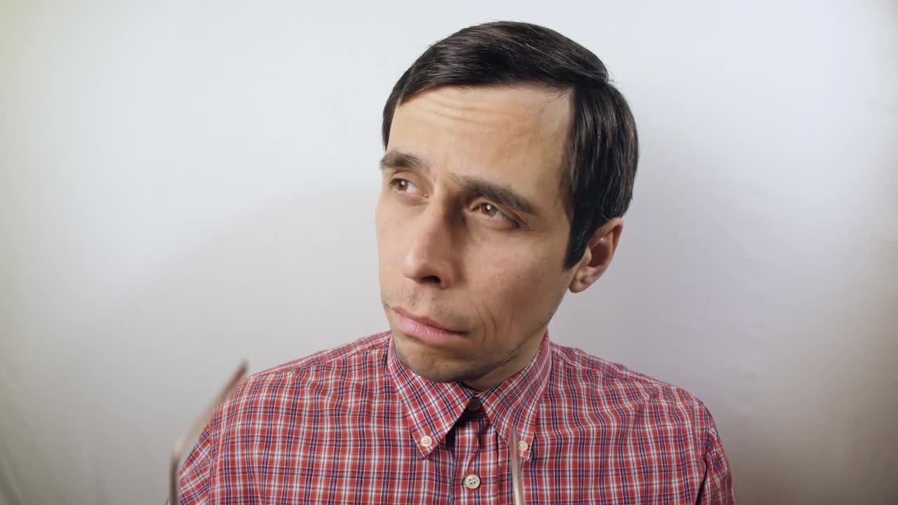 Stock Video Confident Nerdy Man Puts On His Glasses Live Wallpaper For PC