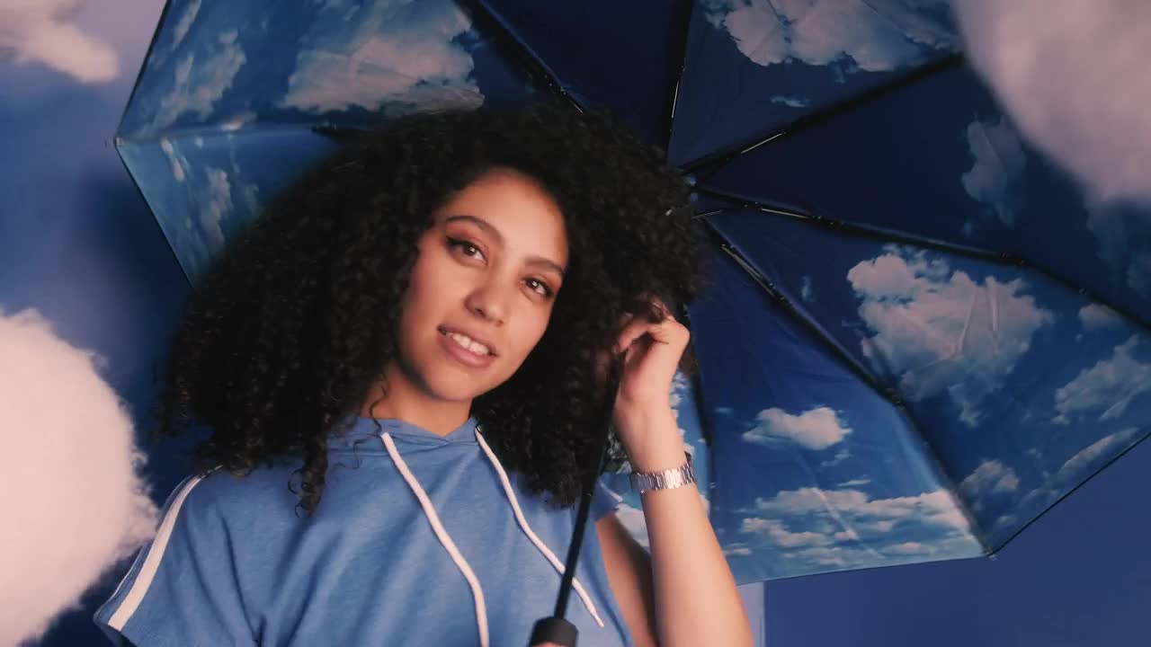Stock Video Conceptual Portrait Of A Girl With Umbrella With Clouds Live Wallpaper For PC
