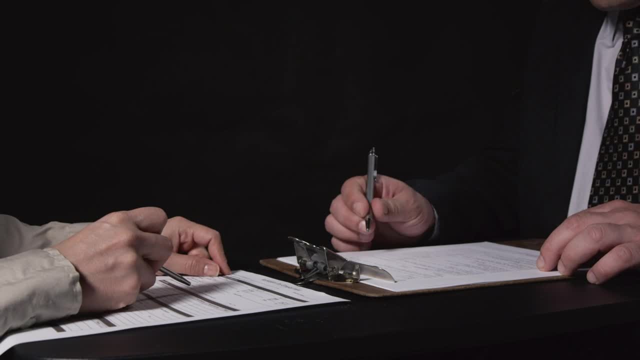 Stock Video Comparing Documents In An Interview Live Wallpaper For PC