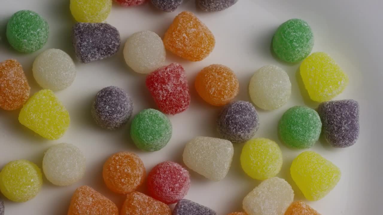 Stock Video Colored Sugary Gums Spinning Slowly Live Wallpaper For PC