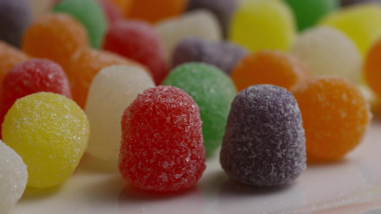 Stock Video Colored Sugar Gummies Slowly Rotating Live Wallpaper For PC