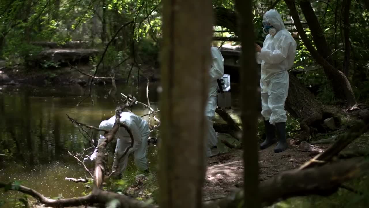 Stock Video Collecting Water Samples From Polluted Lake Live Wallpaper For PC