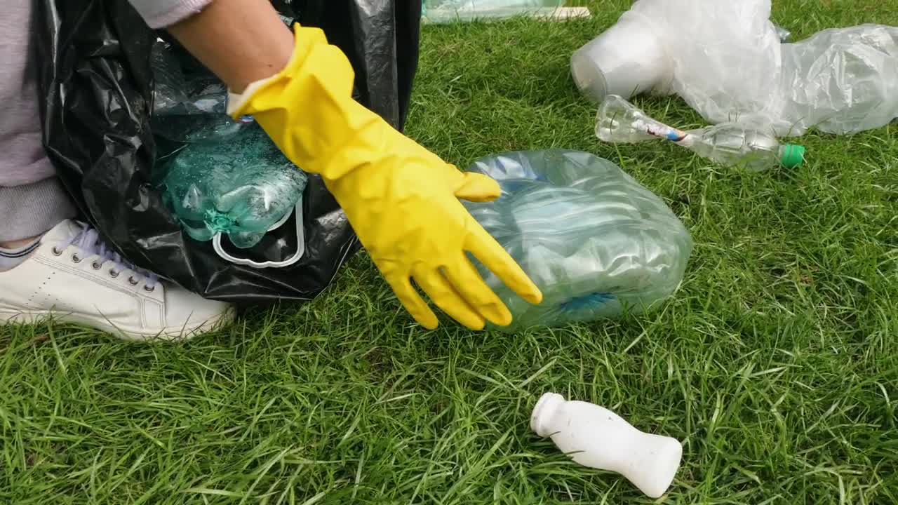 Stock Video Collecting Plastic Garbage From The Ground Live Wallpaper For PC