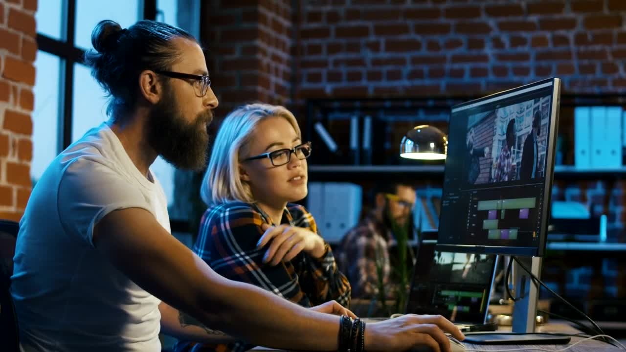 Stock Video Colleagues Working On Video Editing Live Wallpaper For PC