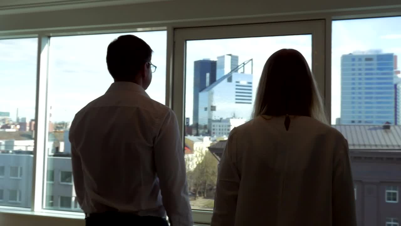 Stock Video Colleagues Looking Out Of A Window Live Wallpaper For PC