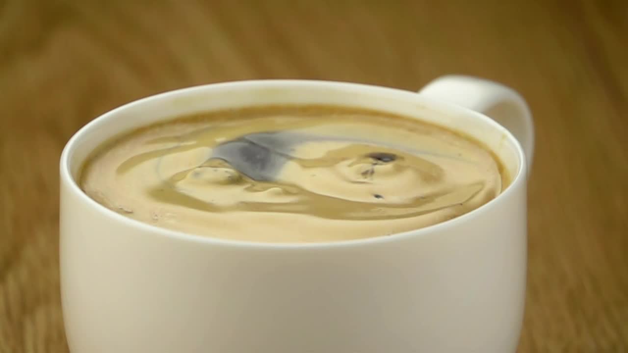 Stock Video Coffee Bean Falling Into A Cup Of Coffee Live Wallpaper For PC