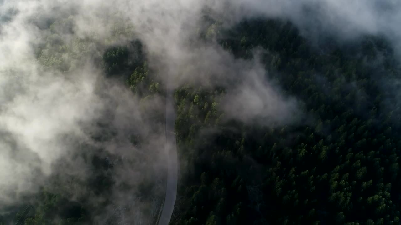 Stock Video Clouds Parting Over A Mountain Road Live Wallpaper For PC