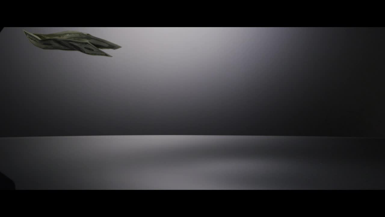 Stock Video Falling Dollars On The Black Table Live Wallpaper For PC