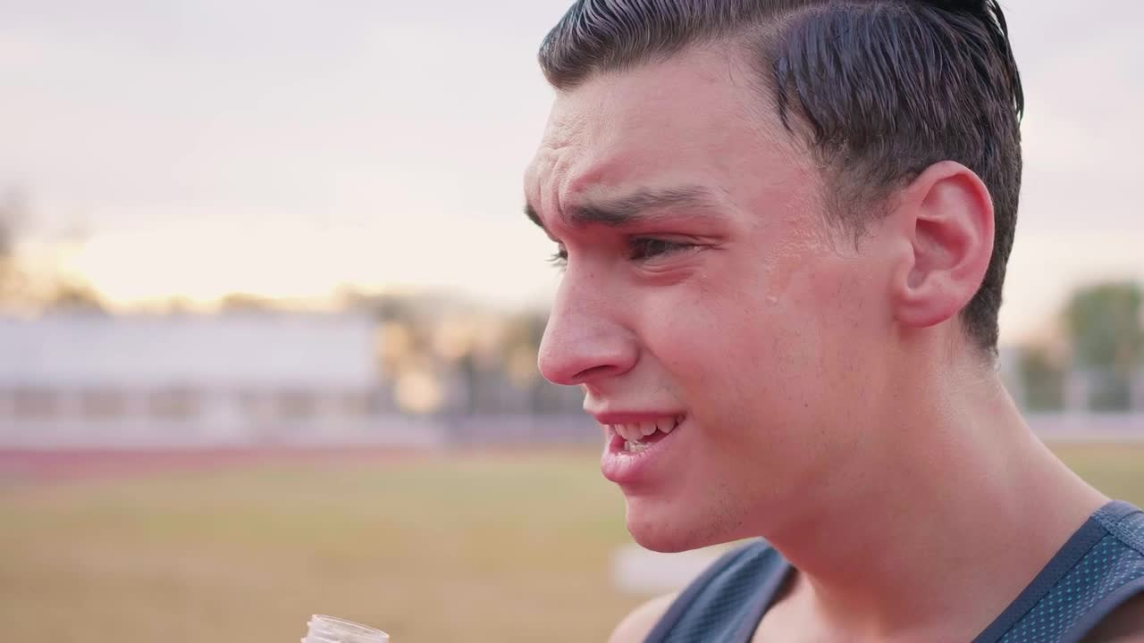 Stock Video Face Of An Exhausted Boy Drinking Water Outdoors Live Wallpaper For PC